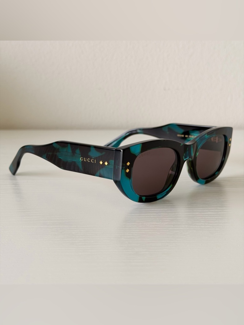 Gucci Teal and Black Patterned Cat-Eye Sunglasses GG1215S 001, Authentic